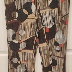 Ladies wide-leg trousers with a distinct brown, black, white, and red geometric